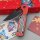 Kizer Mini Militaw Frontflipper Nitro-V Stahl G10 Red Party Streamers