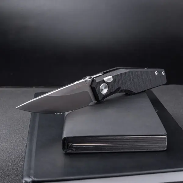 Real Steel RSK Spectrum satin / black G10 Nitro-V Stahl Button Lock