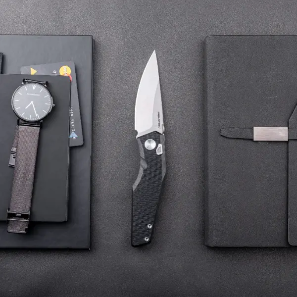 Real Steel RSK Spectrum satin / black G10 Nitro-V Stahl Button Lock