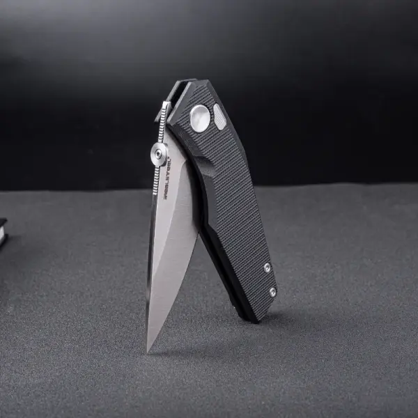 Real Steel RSK Spectrum satin / black G10 Nitro-V Stahl Button Lock