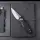 Real Steel RSK Spectrum satin / black G10 Nitro-V Stahl Button Lock
