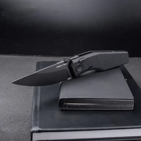 Real Steel RSK Spectrum PVD black / black G10 Nitro-V Stahl Button Lock
