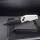 Real Steel RSK Spectrum PVD black / Ivory G10 Nitro-V Stahl Button Lock