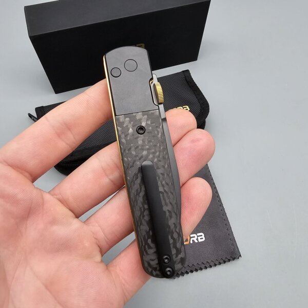 CJRB Locust PREMIUM - J1951G-BCF Locust S90V Stahl Titanium Backen und Carbon Fiber Griff Keramikkugellager Button Lock